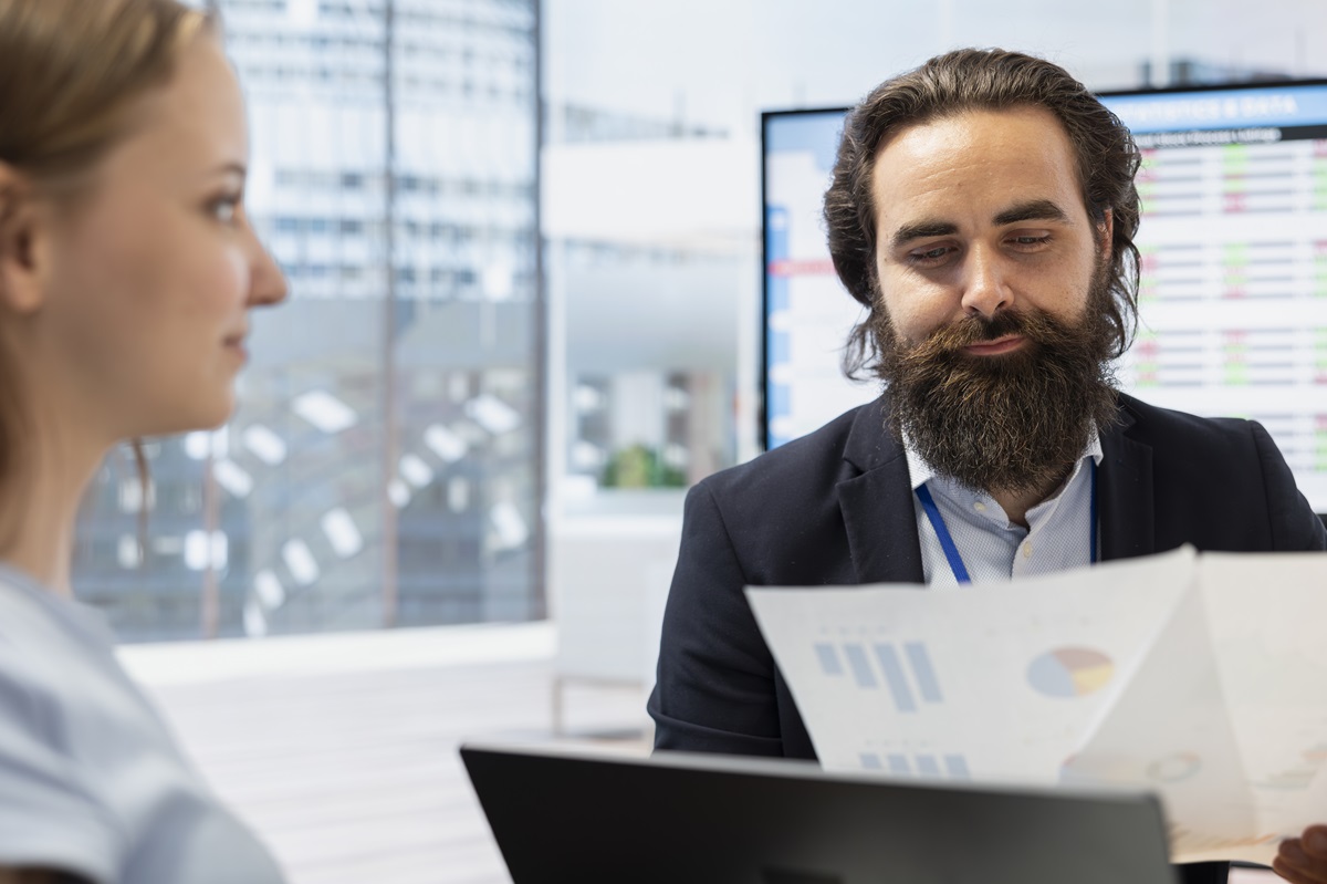 Coworkers handling supplier risk management